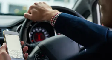 Driving while distracted by mobile phone
