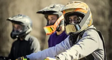 Group of friendly motorcyclists wearing helmets