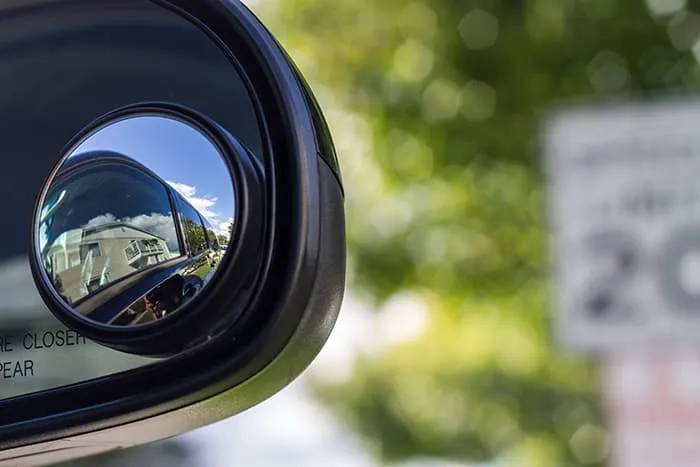 Close up of car wing mirror