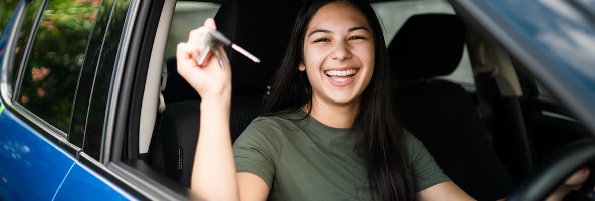 Woman happy after buying a car