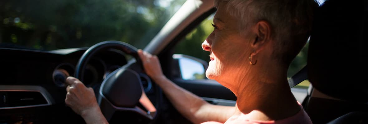 Woman drives a car in Melbourne Australia