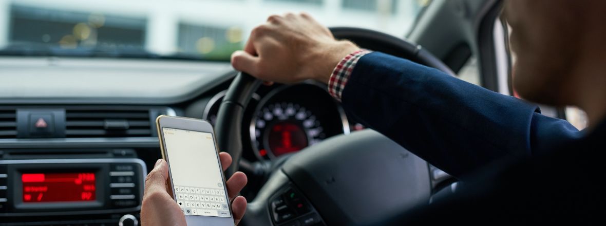 Driving while distracted by mobile phone