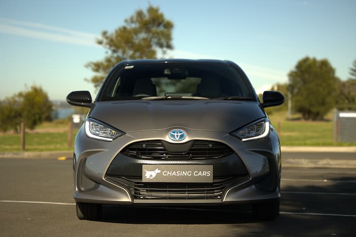 grey toyota yaris parked on road outside