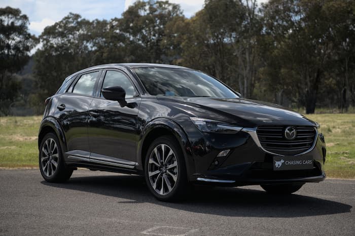  Black Mazda CX3 parked on road outside