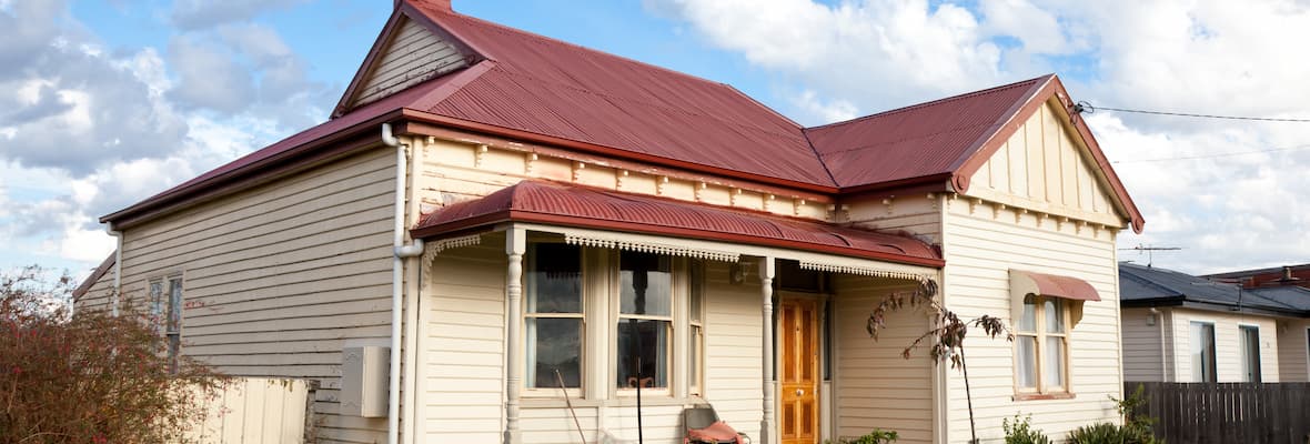 Older house in Australia with a red roof