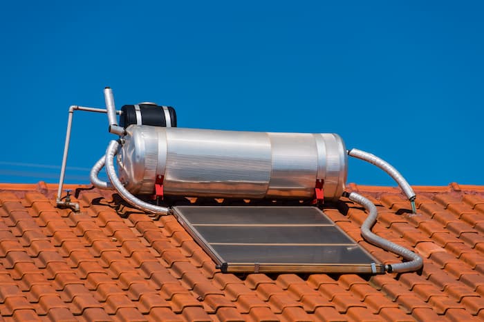 Solar water heater on a terracotta roof