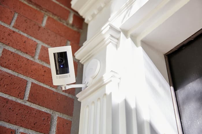 A home security camera outside a home