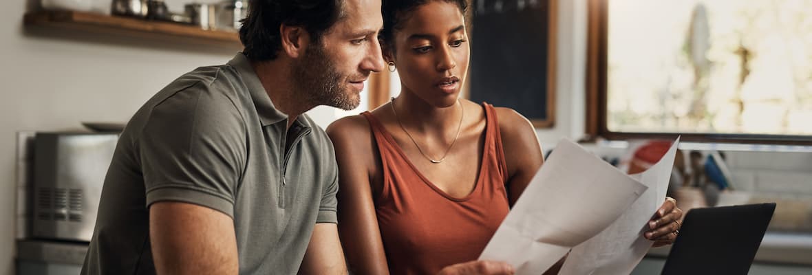 Couple reading their important documents