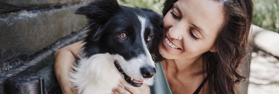 Woman with Border Collie dog