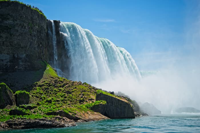 Three streaming waterfalls at the end of the Niagara Gorge at Niagara Falls.